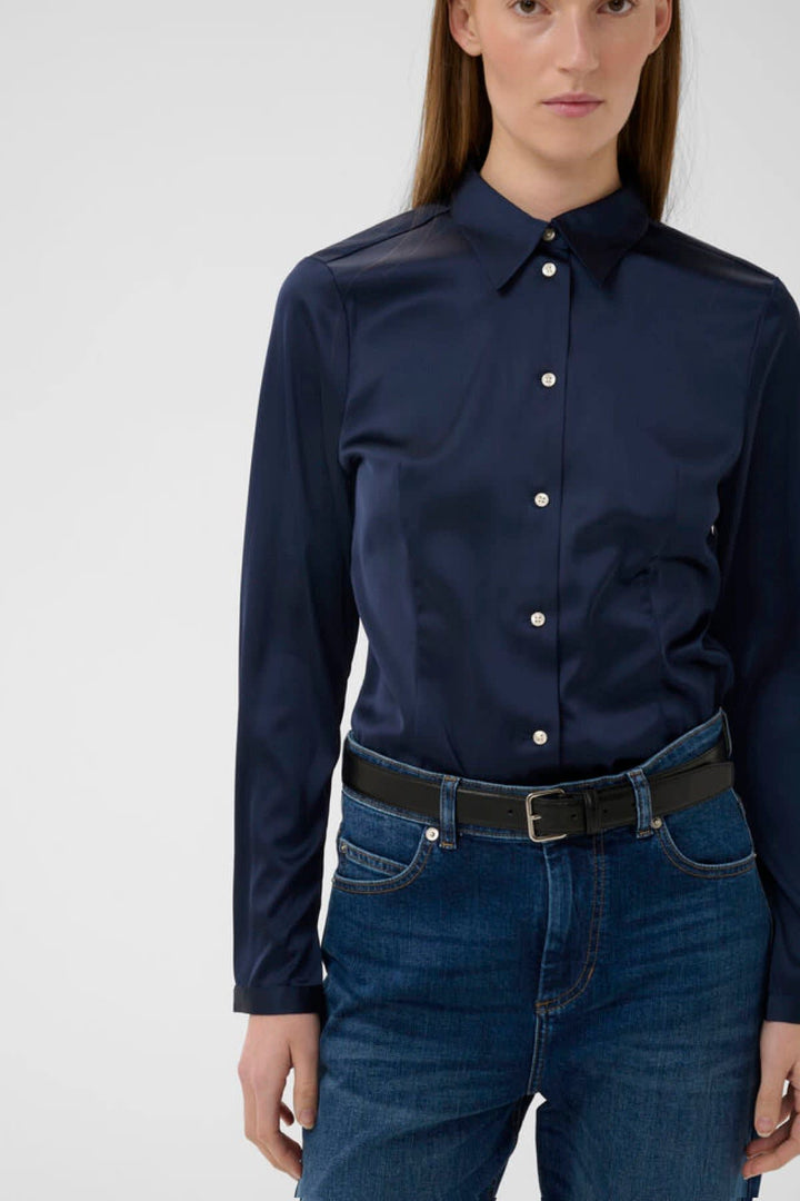 Vue de face blouse Inwear pour femme bleu avec col chemise et boutons - Valérie Simon