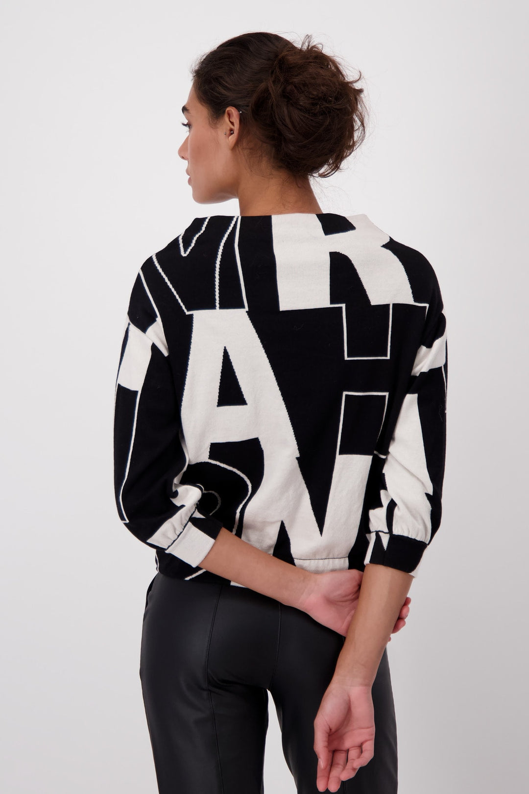 Pull jacquard avec lettrage