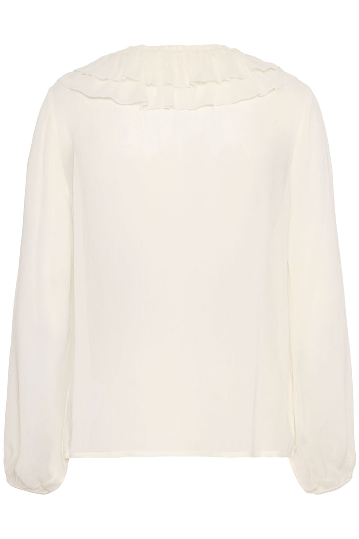 Blouse Sanaz blanche avec col volant, coupe fluide et manches longues transparentes à l'arrière.