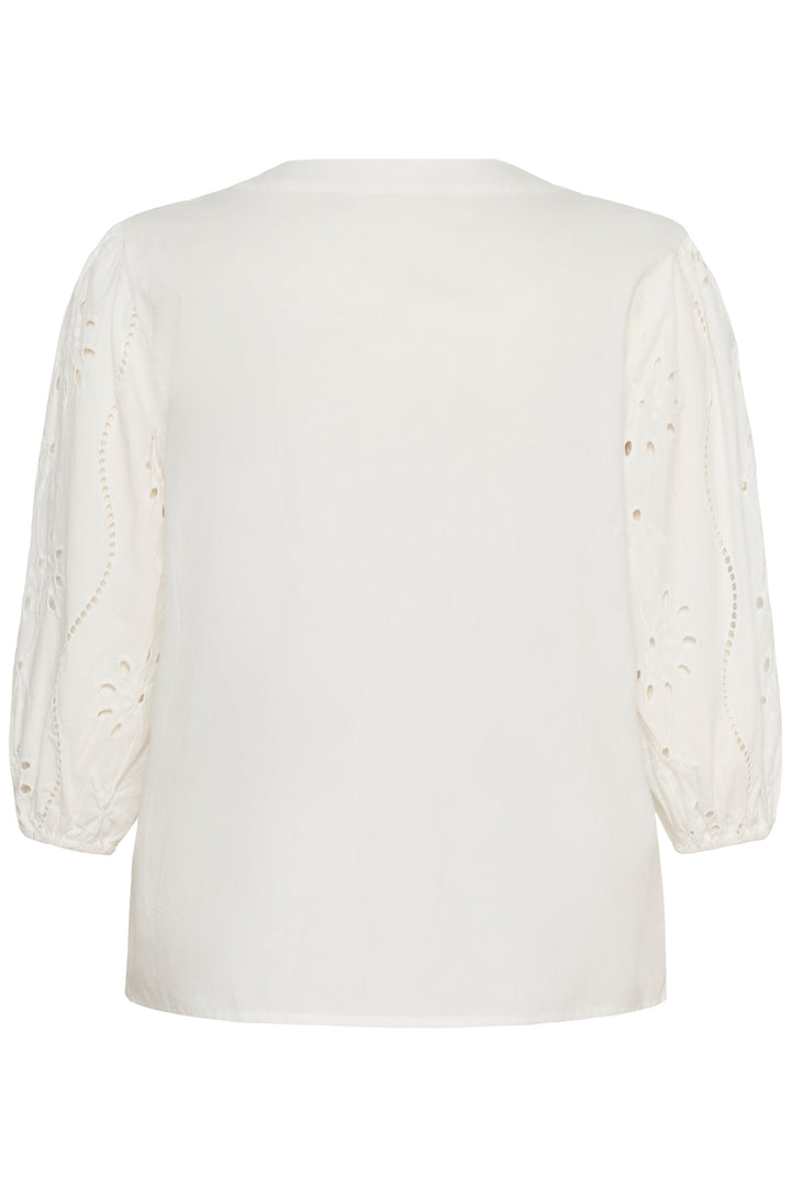 Blouse Signe avec détails ajourés et broderies raffinées, vue de dos, encolure ronde, manches longues. Élégante et féminine.