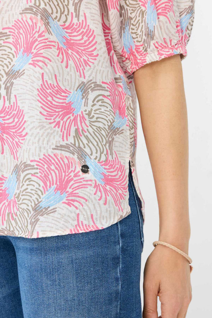 Blouse VIVA à motif floral en rose, bleu clair et taupe, avec coupe ample et fluide, parfaite pour l&