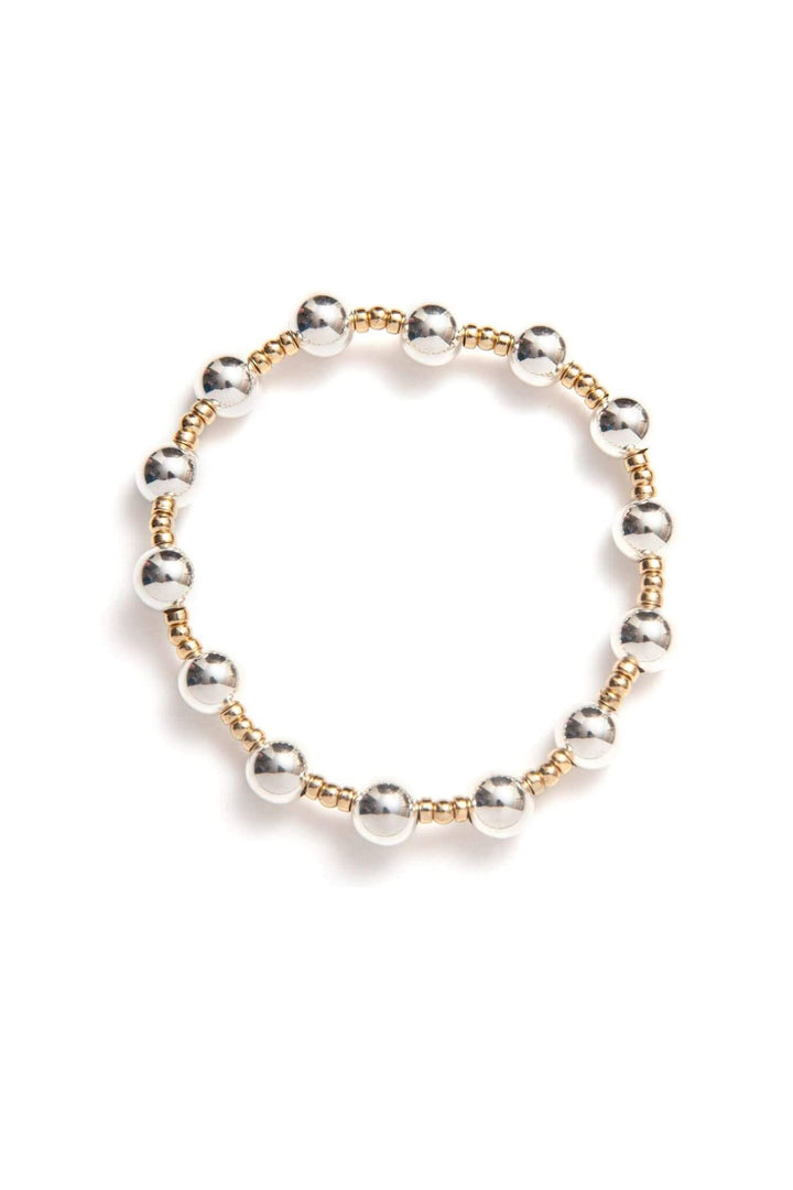 Bracelet Be Bubbly avec perles dorées et argentées, mélange élégant et ludique, Collection Dress To Impress.