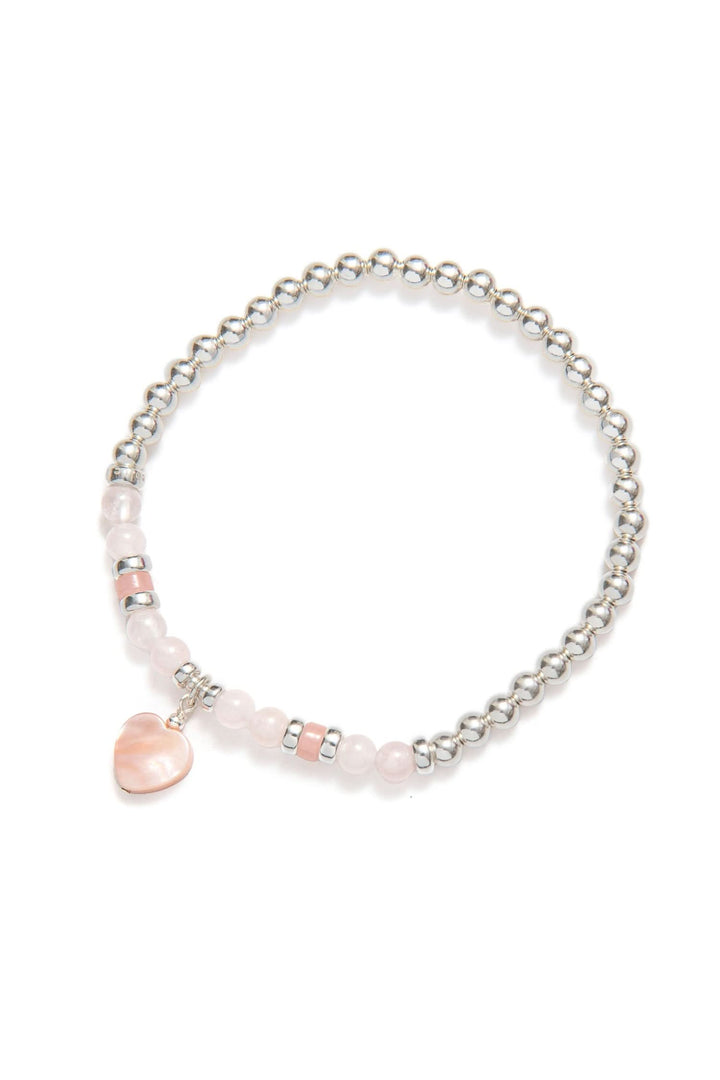 Bracelet Be Kind en Argent Sterling avec breloque cœur en Quartz Rose et détails scintillants.
