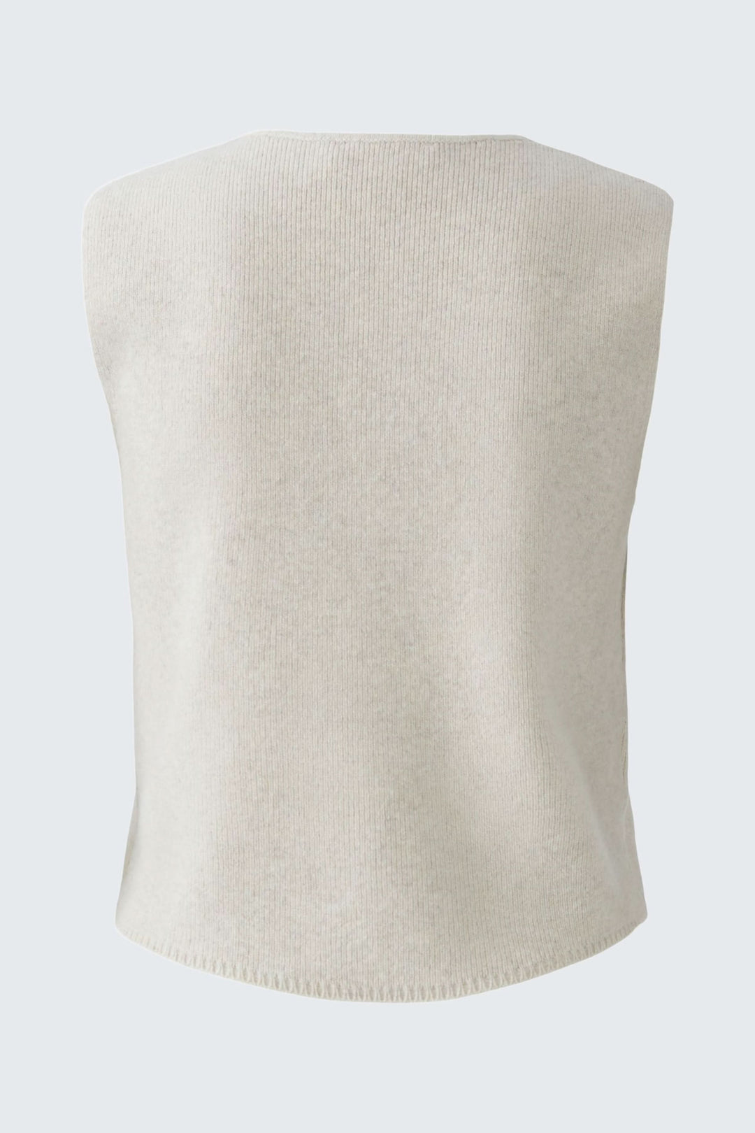 Cardigan sans manches en maille douce, couleur crème, vue arrière, design minimaliste et moderne.