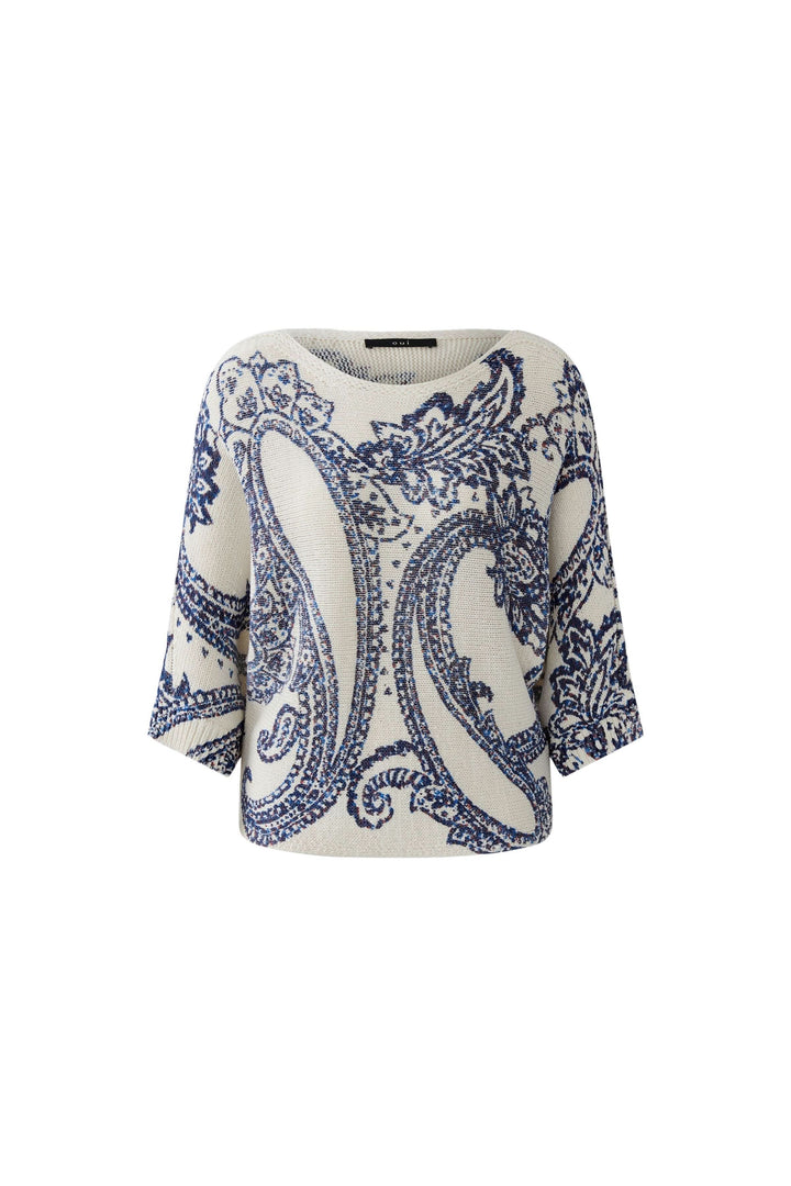 Chandail en maille à motif cachemire avec manches trois-quarts, offrant une silhouette fluide et moderne, motif artistique.