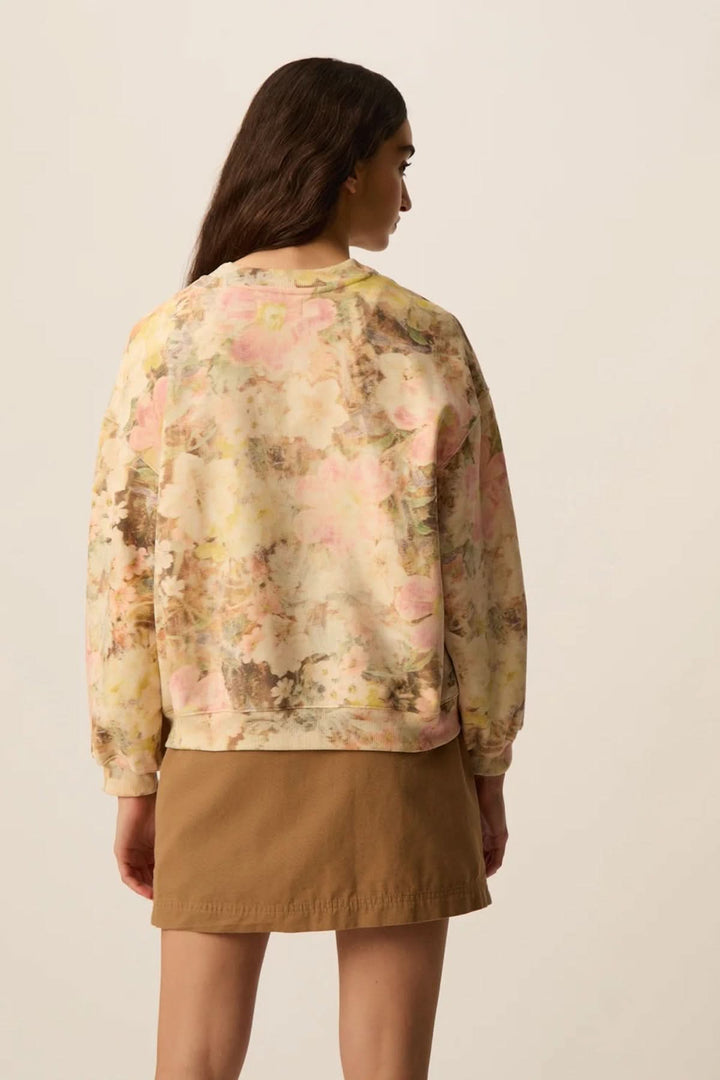 Chandail ouaté imprimé floral JOEME avec coupe ample et manches longues, parfait pour un look décontracté et moderne.