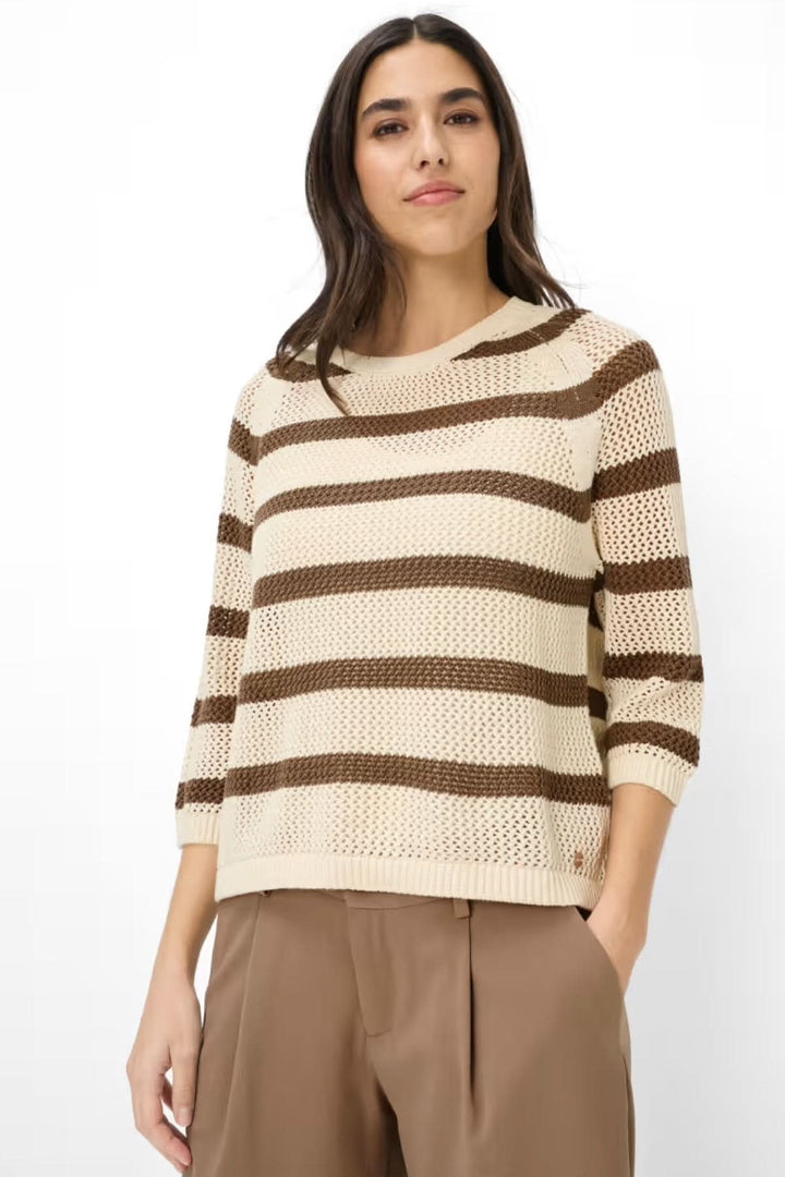 Chandail tricot NALA rayé avec manches trois-quarts, maille ajourée, et coupe confortable. Décris moi le produit en français.