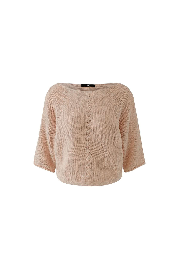 Chandail tricot léger rose à manches courtes avec encolure bateau et motif central, coupe ample et fluide, idéal pour mi-saison.