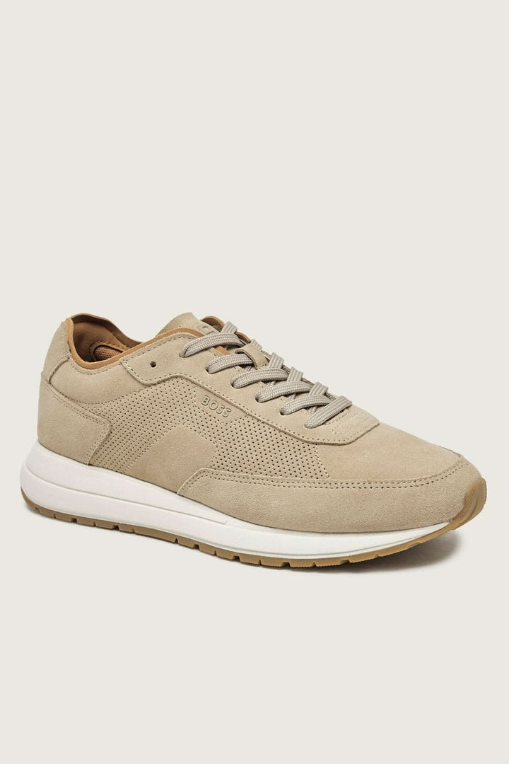 Chaussure de ville Vinston en suède perforé beige avec semelle contrastante, design minimaliste et détails ton sur ton.