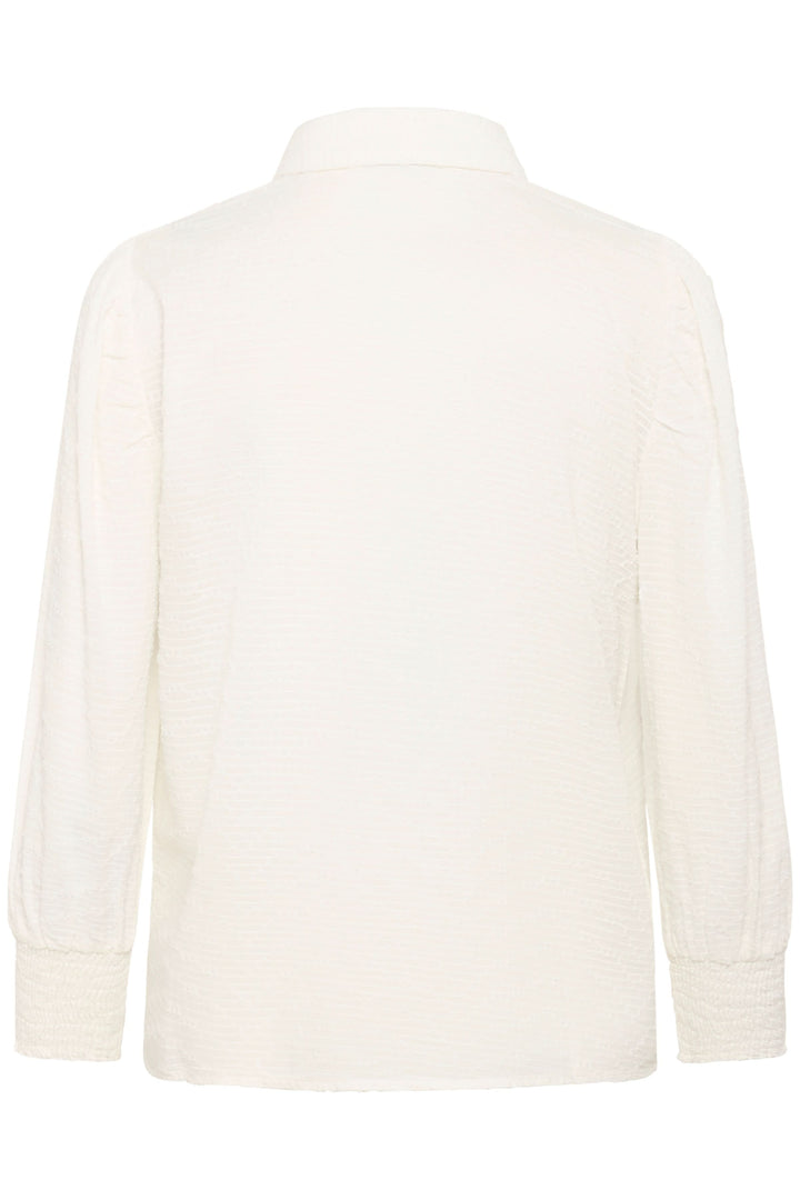 Vue arrière de la Chemise Penelope texturée à manches bouffantes blanche avec col chemise et tissu texturé.