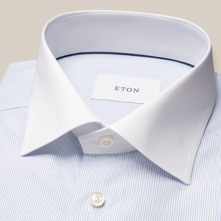Chemise ETON bleu clair à rayures avec col blanc, tissu en sergé, élégance moderne et coupe cintrée.