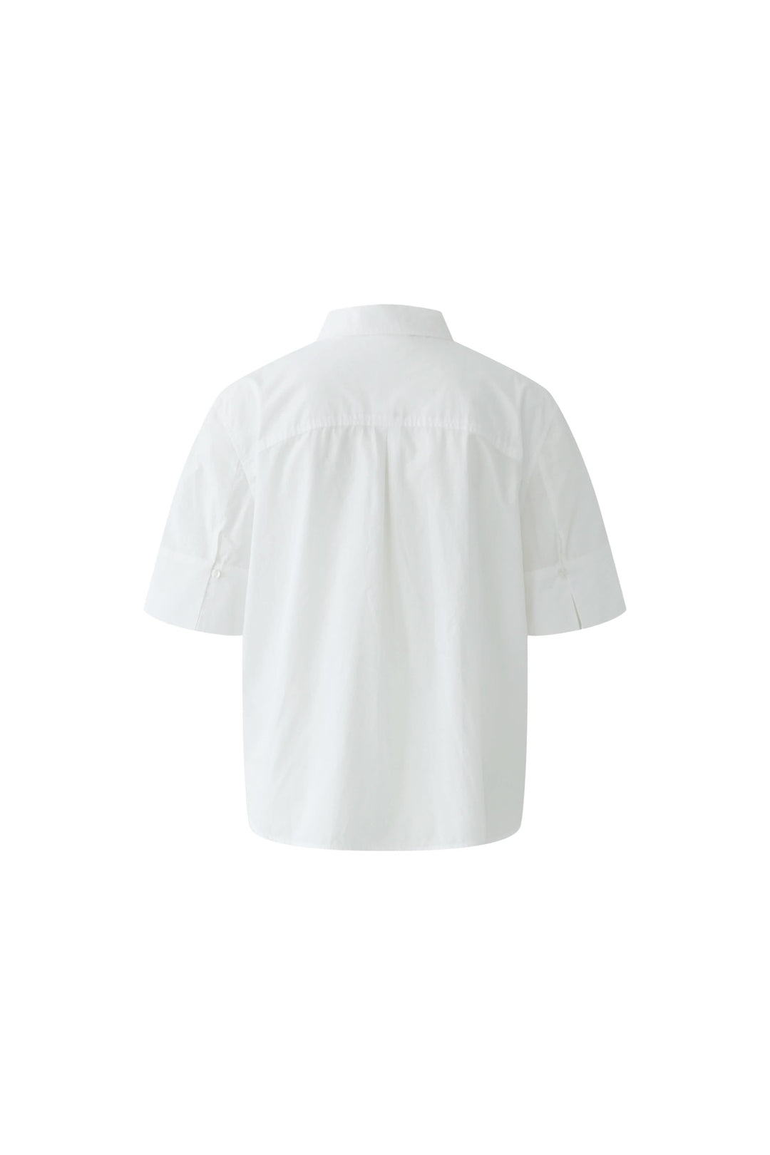 Dos de chemise à manches courtes avec broderie, coupe fluide, col classique, féminine et moderne.