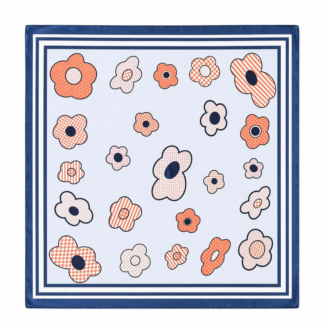 Foulard carré imprimé fleurs graphiques avec motif floral stylisé, texture légère et bordure contrastante pour un style moderne.
