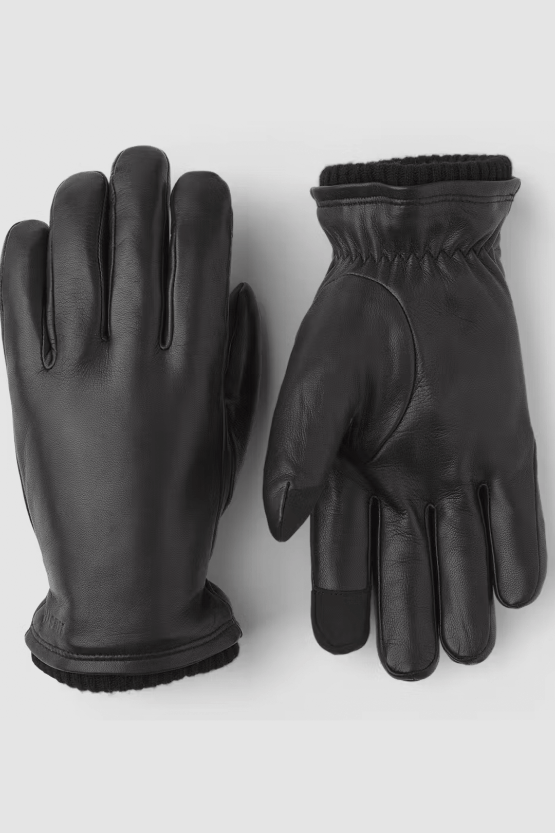 Gants de cuir John élégants et fonctionnels, doublure en Primaloft pour confort et chaleur, détails modernes.