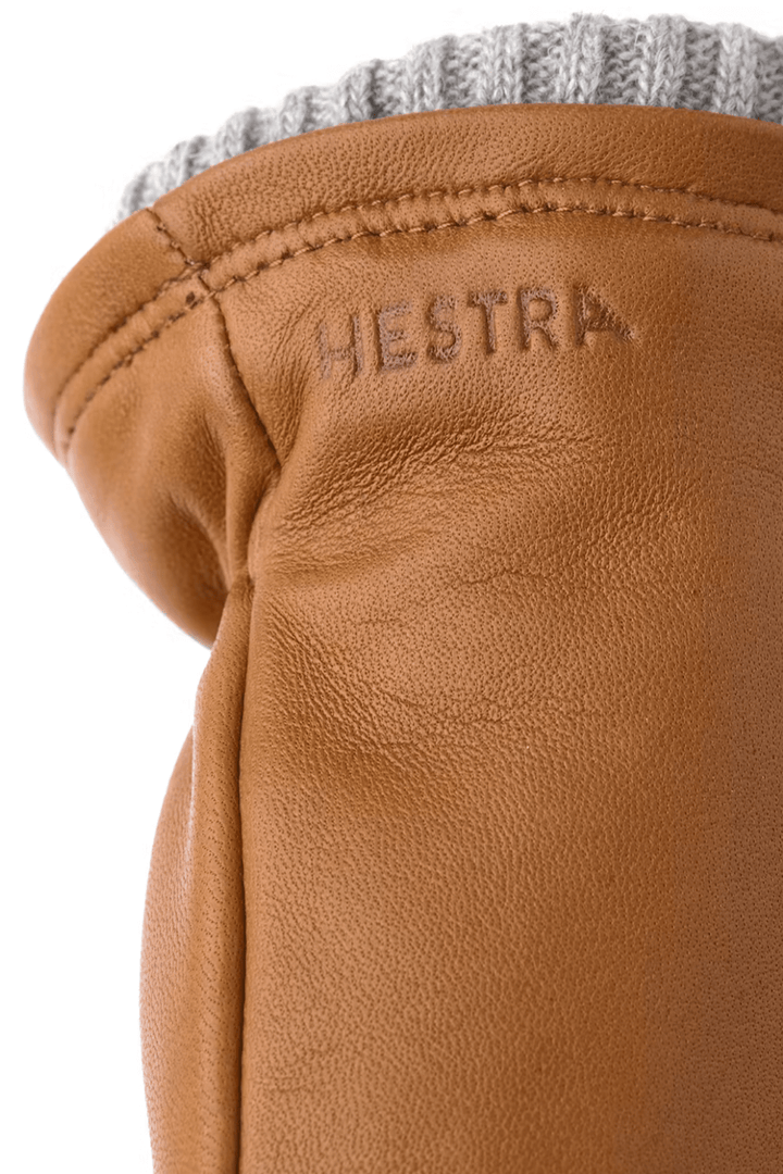 Gants en cuir Hestra avec poignet en laine côtelée, élégants et chauds pour l'hiver.
