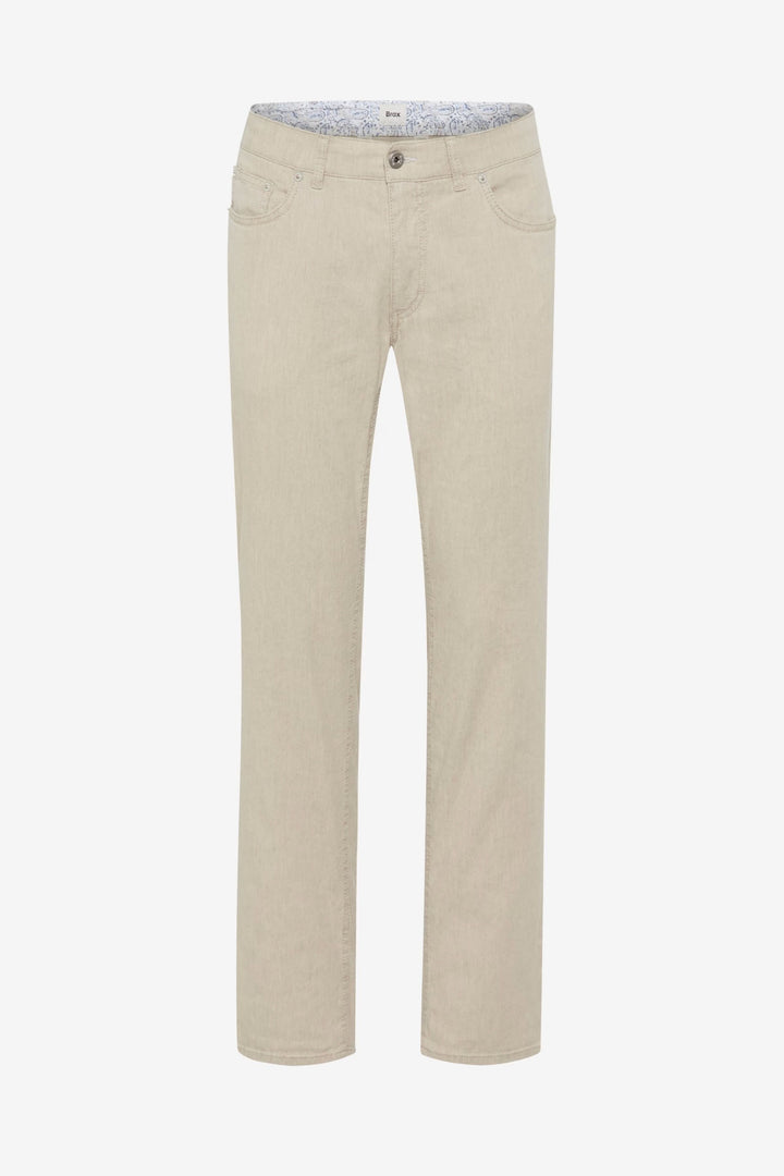 Jean décontracté beige en lin, coupe droite, léger et confortable, idéal pour un style estival casual.