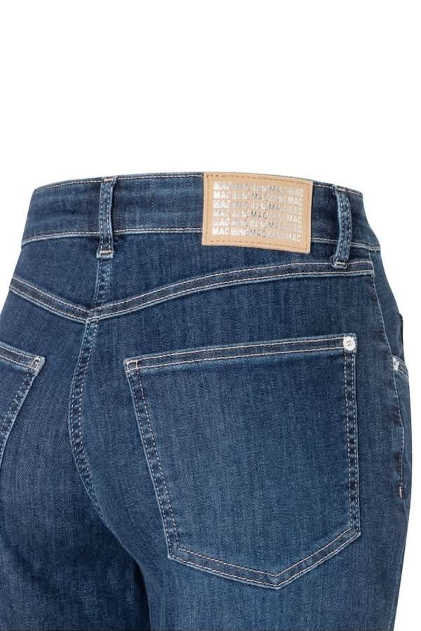Jeans coupe droite à revers avec taille mi-haute et design moderne pour un style intemporel. Denim extensible pour confort durable.