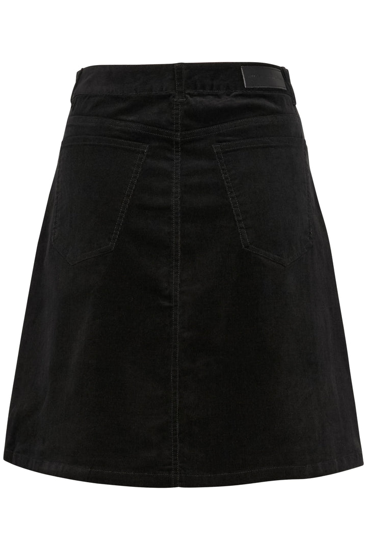 Jupe Rylie en velours noir, coupe slim avec poches avant et arrière, taille 36/S, élégante et moderne.