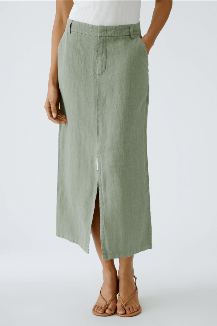Jupe longue en lin vert, taille haute avec fente avant et poches, idéale pour un look d&