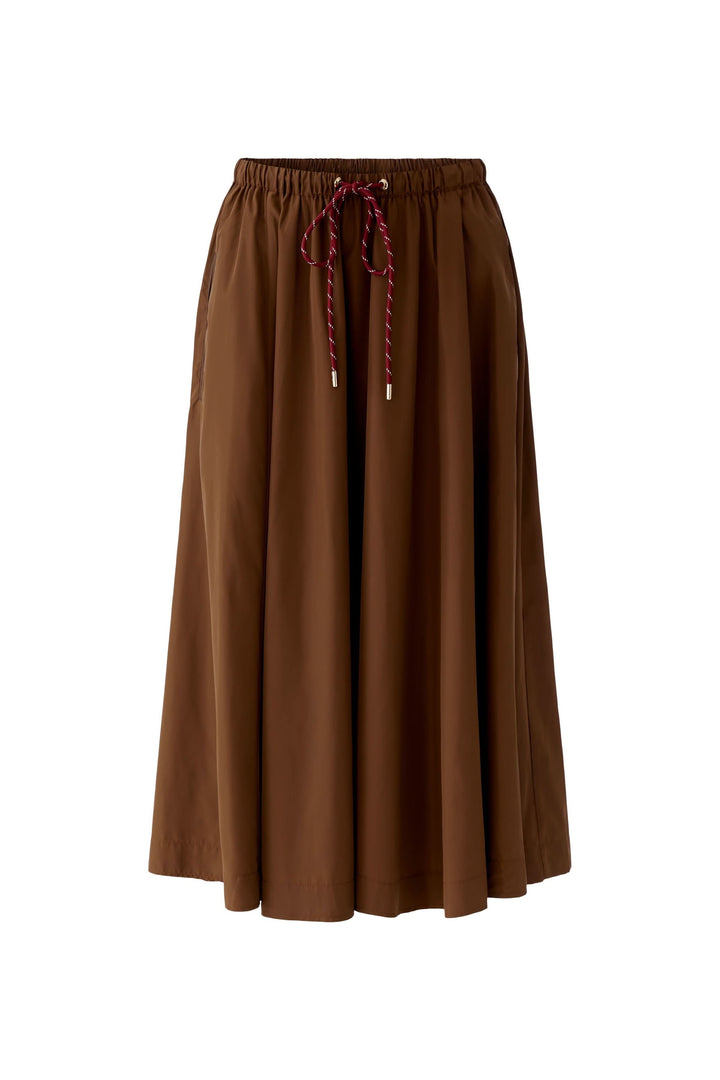 Jupe midi fluide marron avec taille élastique et cordon ajustable, idéale pour un look moderne et confortable au quotidien.