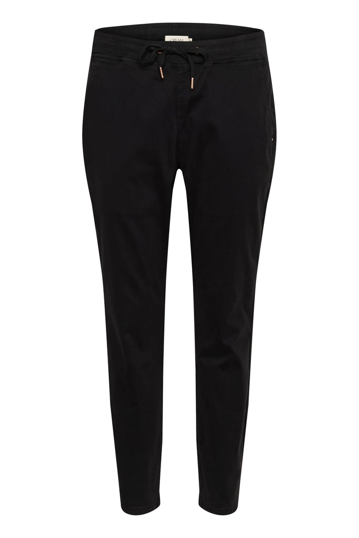 Pantalon décontracté noir style jogger chic avec taille élastique et cordon ajustable, poches latérales.