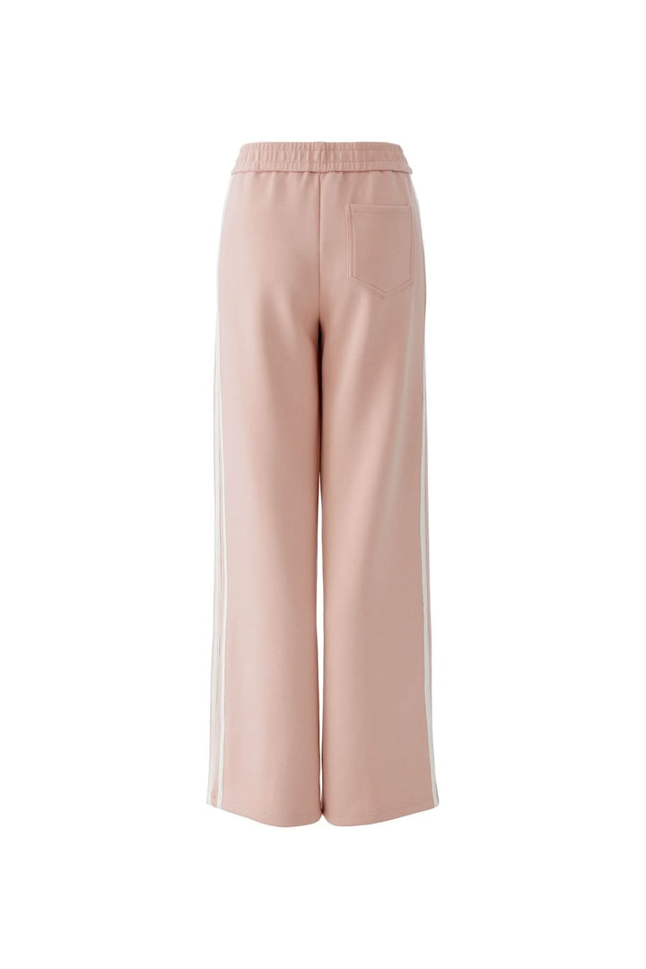 Pantalon coupe moderne polyvalent, rose, vu de dos, en tissu élégant avec ceinture élastique, adapté pour toutes les occasions.