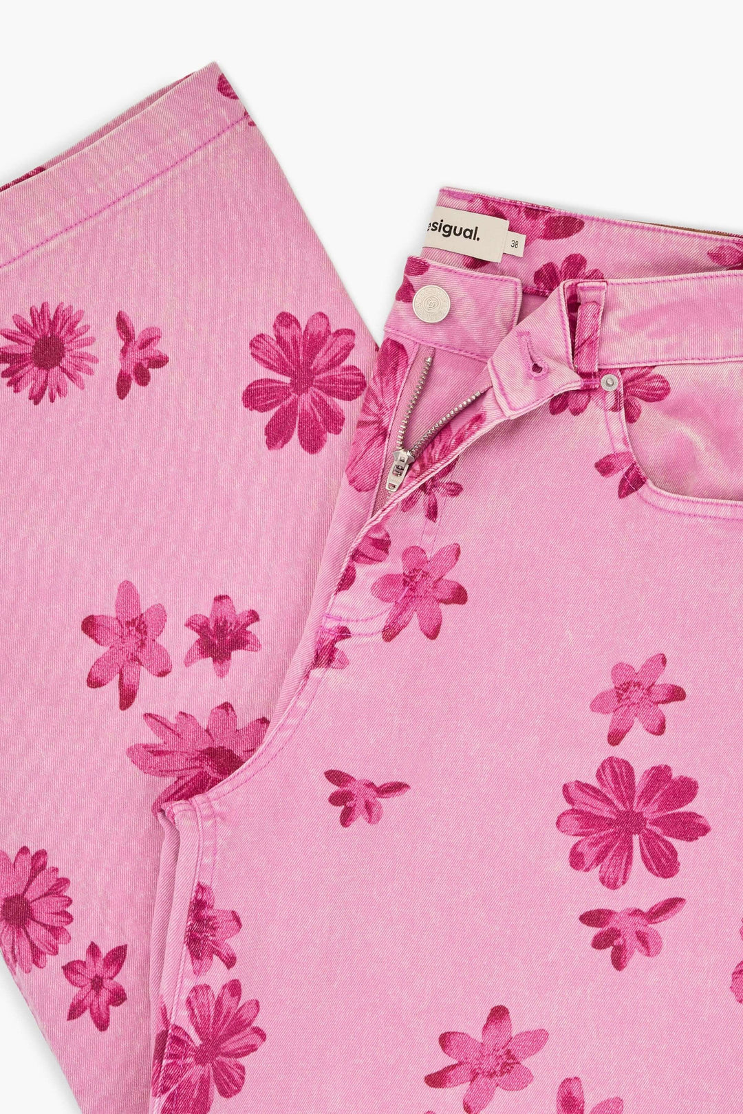 Pantalon large à imprimé floral rose avec fermeture et motif audacieux.