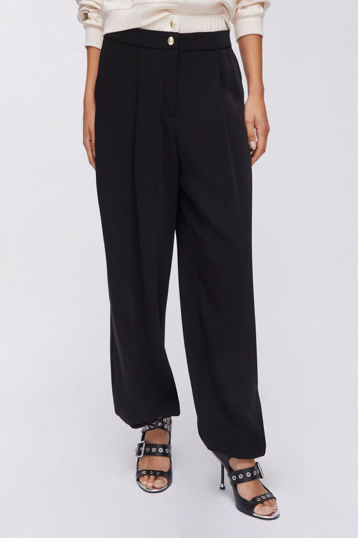Pantalon large à plis avec taille contrastante, élégant et contemporain, avec boutons décoratifs pour un style raffiné