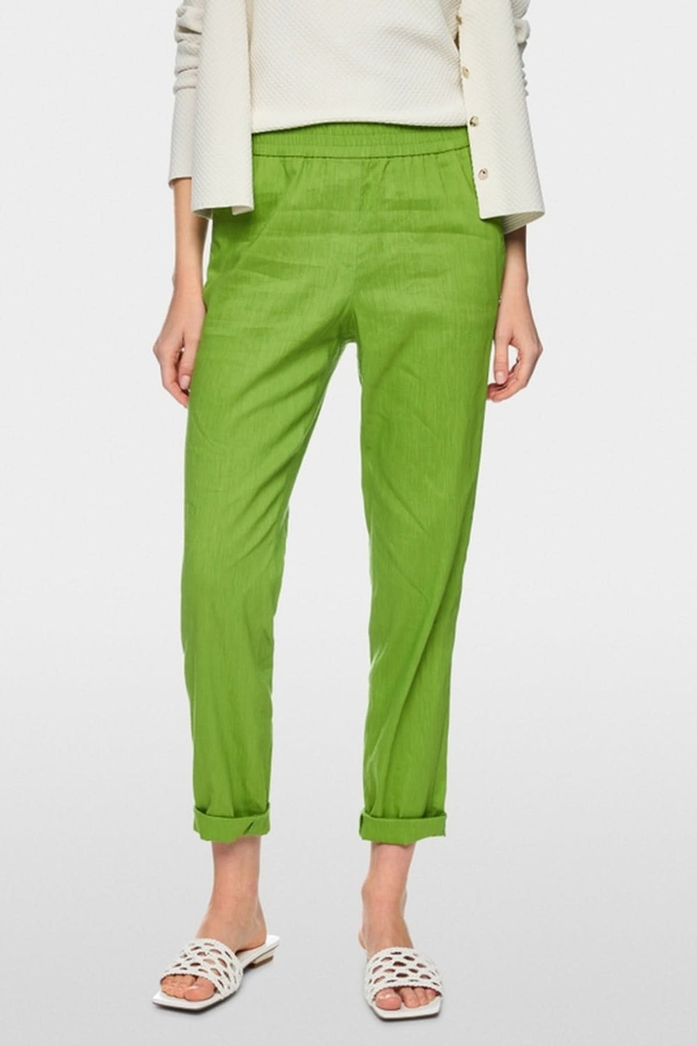 Pantalon léger à enfiler RHODOS en lin vert pour l'été, avec ceinture élastique et poches, offrant confort et liberté de mouvement.