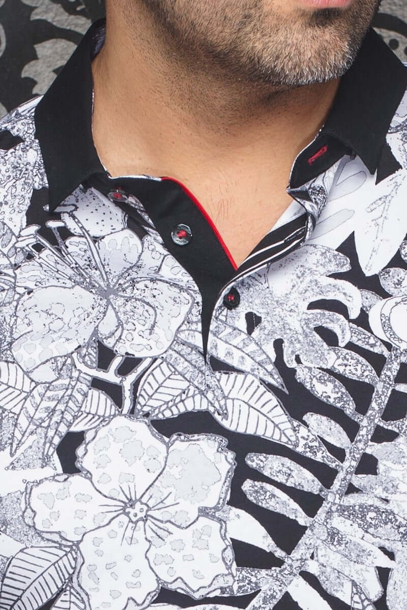 Polo Bennett pour homme avec motifs floraux en noir et blanc, col contrastant et détails sophistiqués.