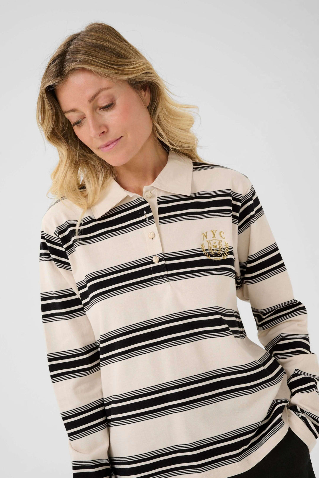 Polo Carmell - Polo à rayures élégantes avec col classique, coupe droite et détail brodé, idéal pour un look casual chic.
