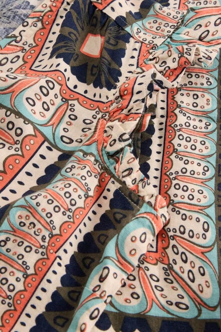 Imprimé graphique de la robe longue sans manches Lorna en lin mélangé avec motifs colorés.
