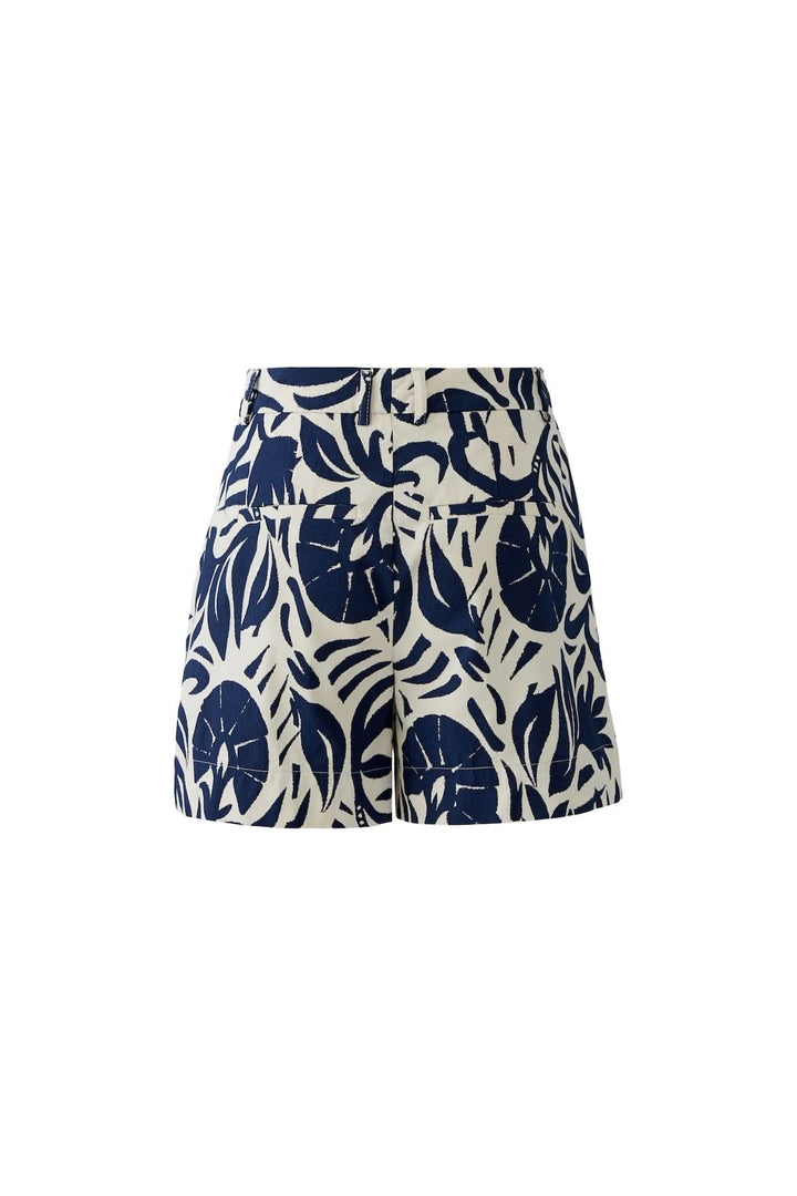 Short coupe moderne essentiel avec motif tropical bleu et blanc, idéal pour un look estival décontracté et confortable.