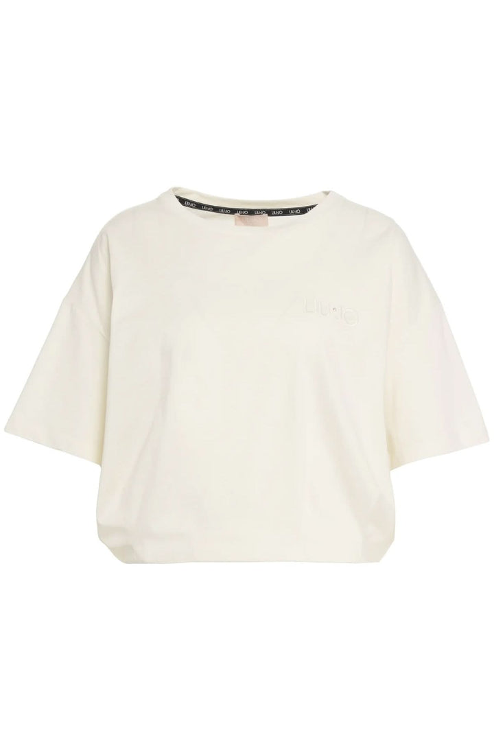 T-shirt oversize avec logo brodé, manches courtes et ourlet élastiqué en coton doux, silhouette moderne pour un look décontracté.