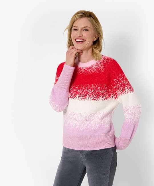 Pull en maille LIZ, aux couleurs dégradées rouge et rose, avec manches raglan et encolure ronde.