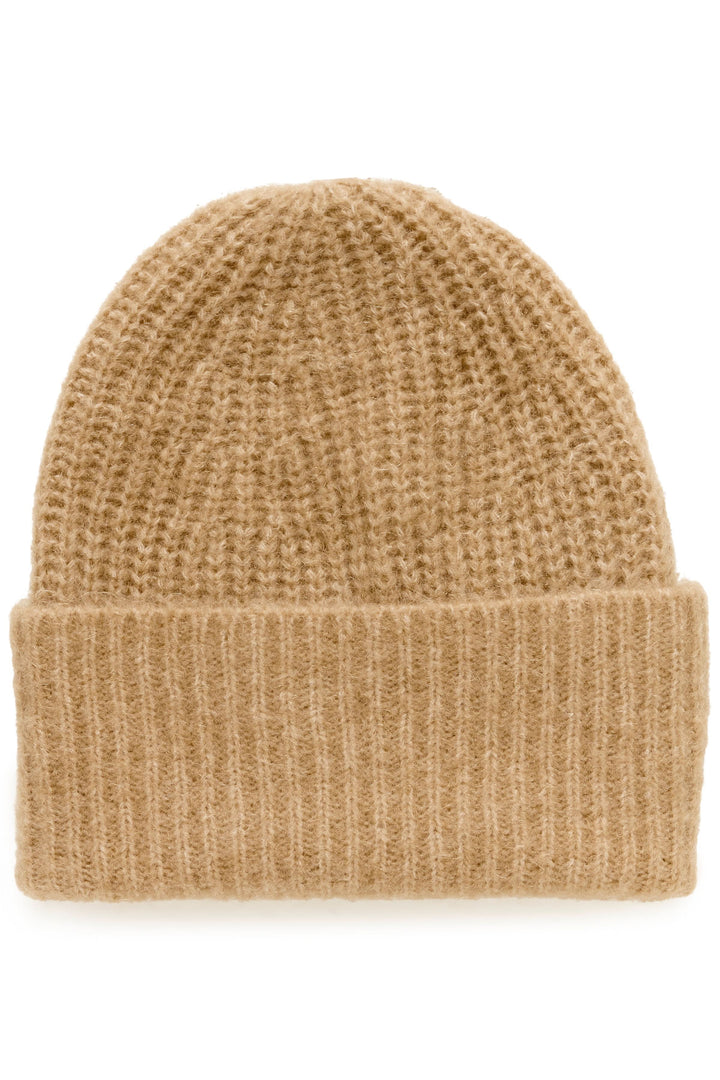 Tuque Sanja en tricot côtelé beige, coupe allongée et revers large, ajoutant une touche moderne et décontractée à votre look.