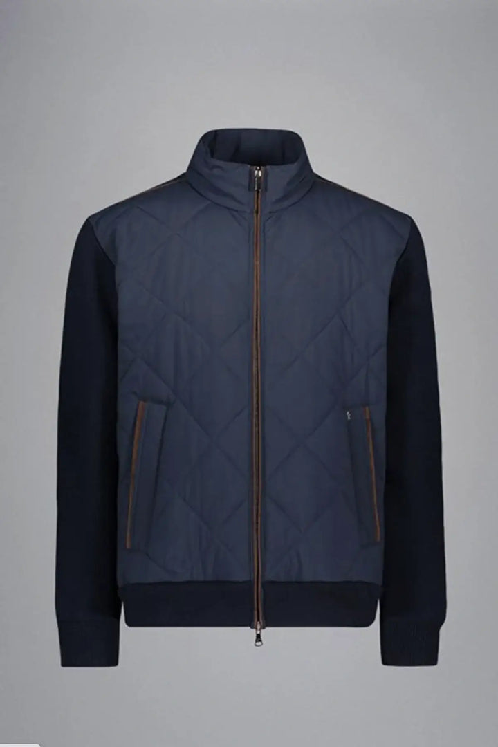 Veste en laine et nylon matelassée pour homme, design épuré avec fermeture zippée double curseur et détails en cuir contrastants.