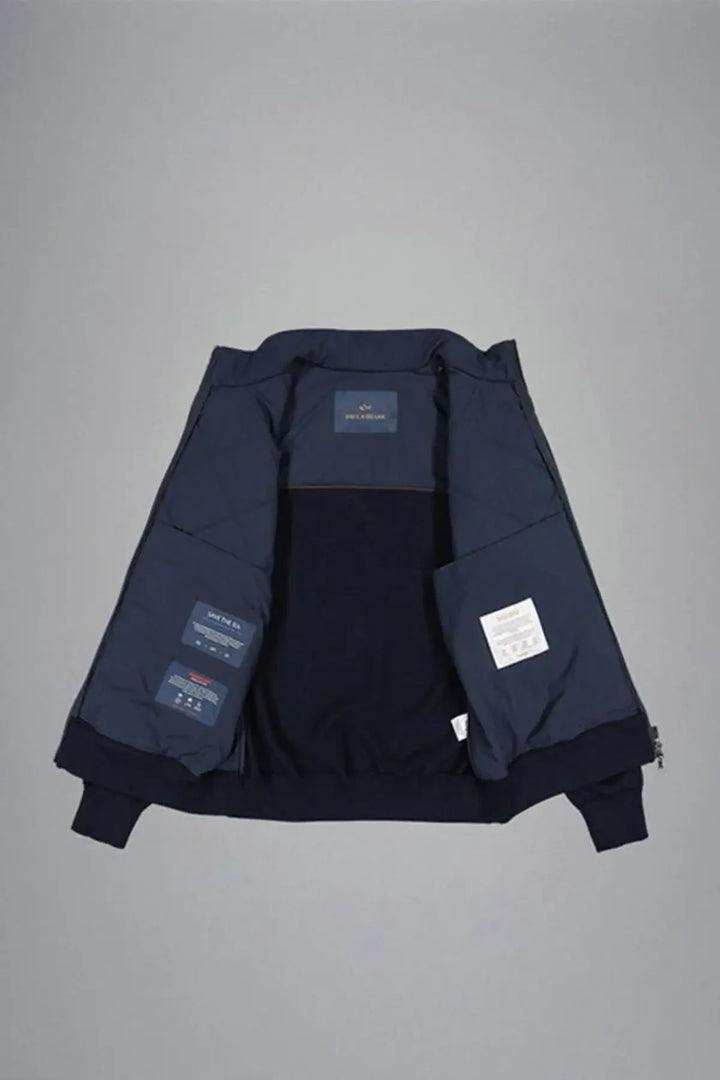 Veste en laine et nylon matelassée pour homme Paul & Shark, intérieure matelassée, détail cuir, fermeture zippée, élégance contemporaine.