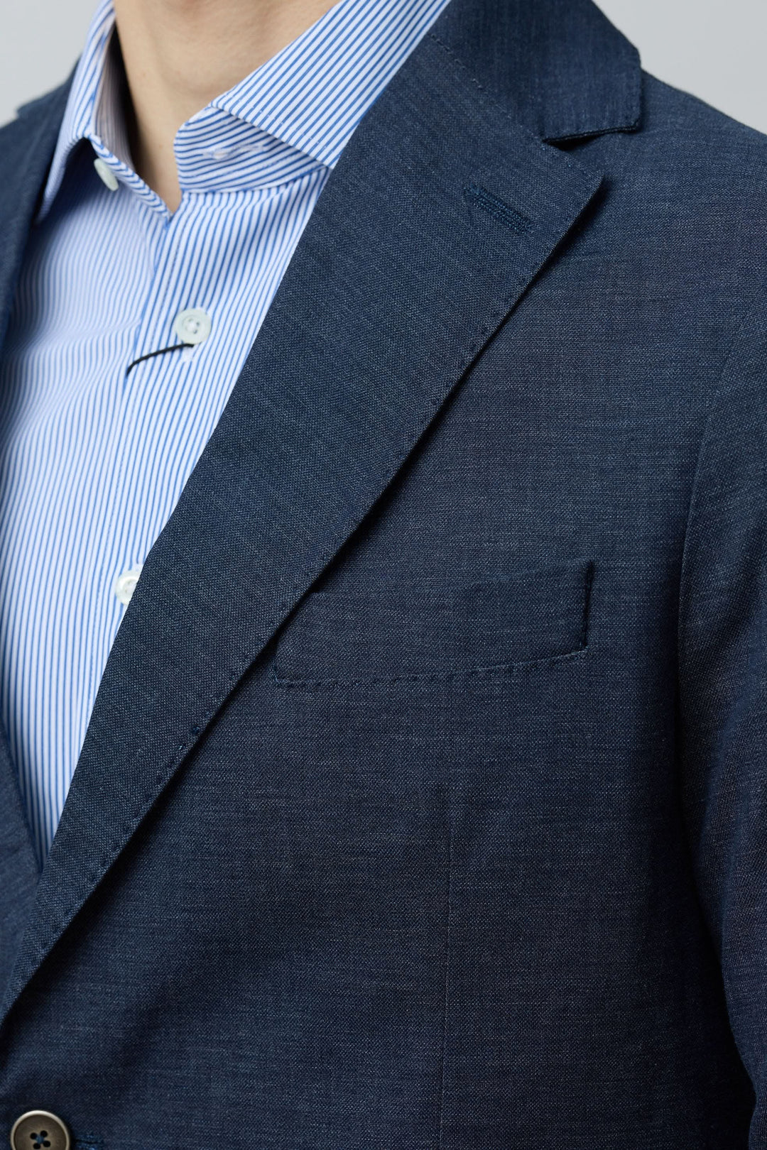 Veston en coton et lin extensible avec coupe moderne et poche poitrine passepoilée, idéal pour le bureau et les occasions décontractées.