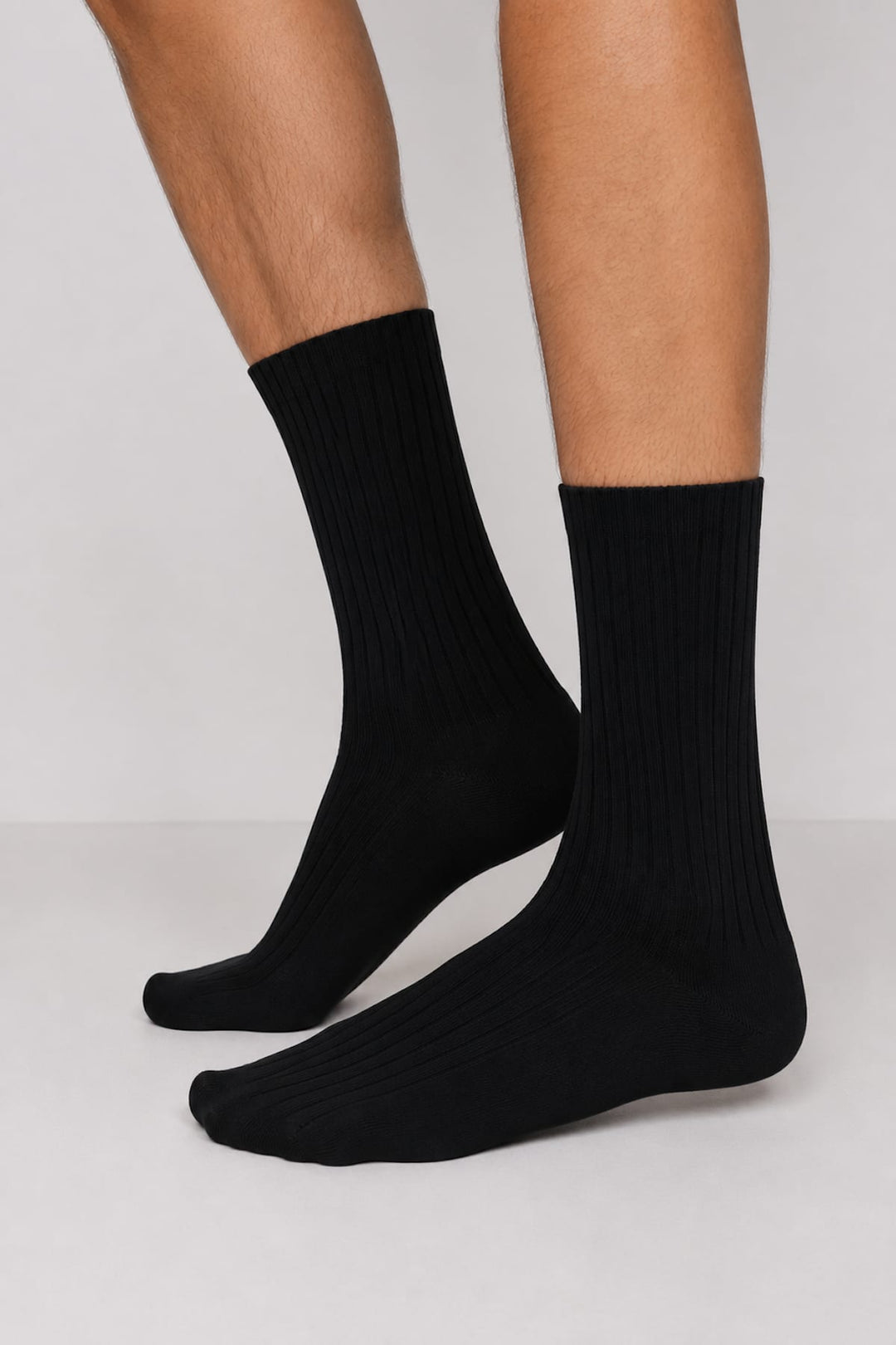 Vue détaillée bas côtelés Marcoliani pour homme noir avec texture visible - Valérie Simon