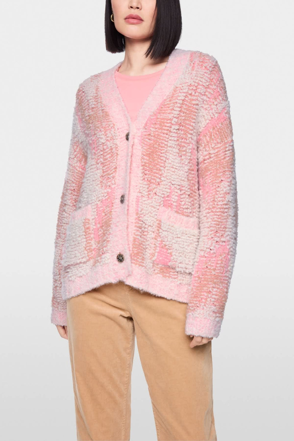 Front view of the women's bouclé knit button cardigan by Marc Cain
