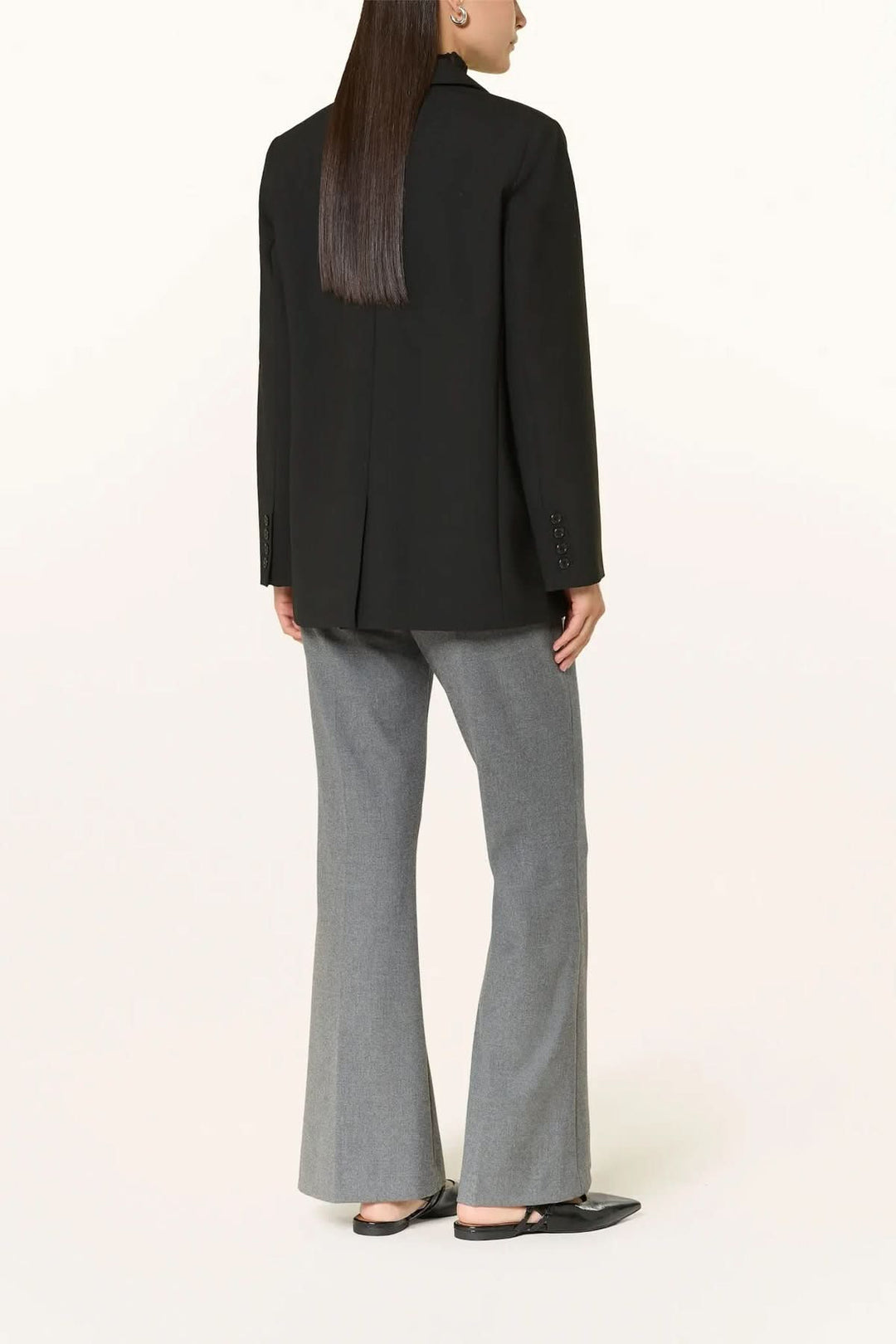 Pantalon habillé coupe évasée à plis marqués