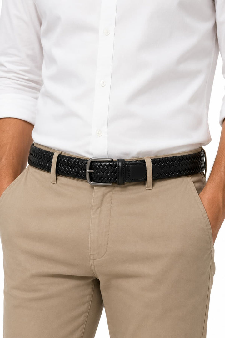 Detailed view of a brown braided leather belt for men with a silver buckle by Anderson&