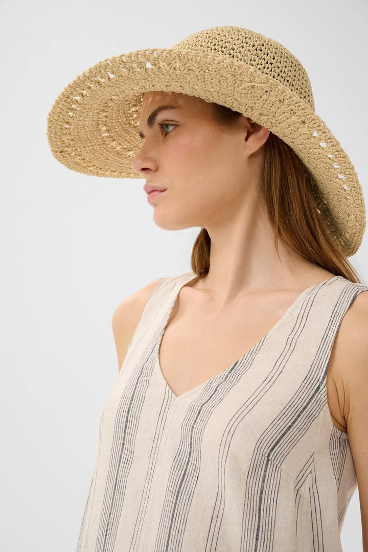 Side view of a beige women&