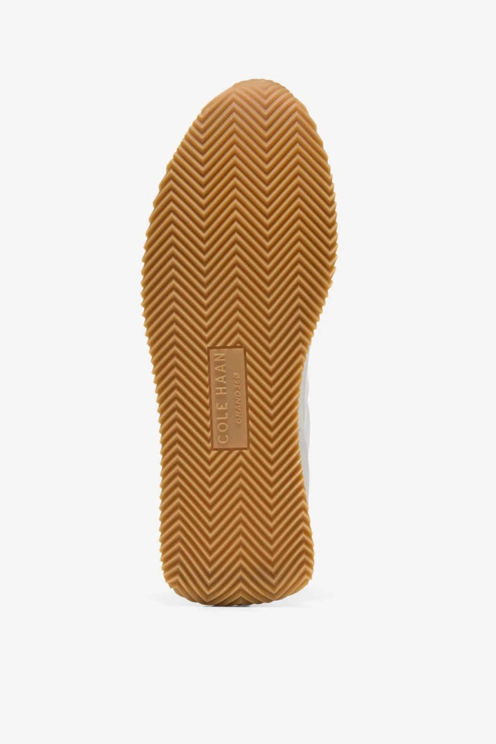 Chaussures de ville Davie Runner en cuir et suède vue de côté pour femme Cole Haan