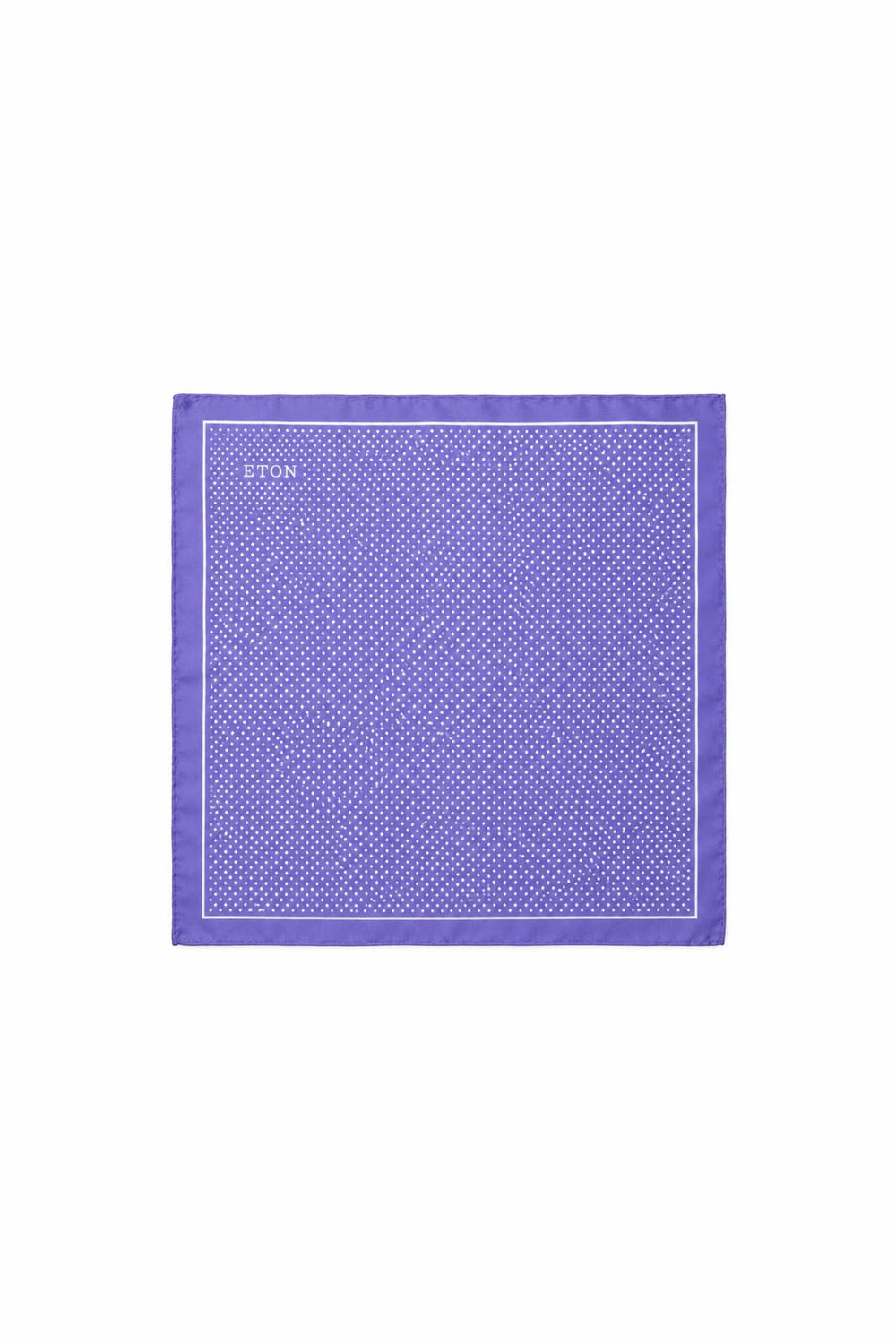 Close-up of a blue and white Eton silk polka-dot pocket square for men - Valérie Simon