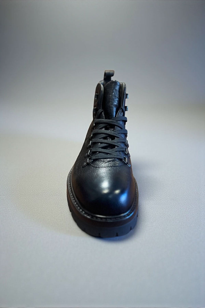 Bottine homme cuir texturé Fabiano Ricci avec semelle crantée pour adhérence et confort, style robuste et élégant.