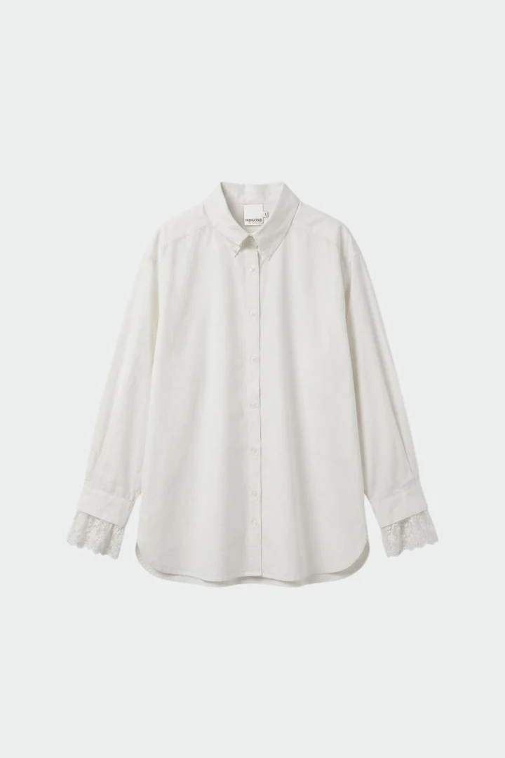 Chemise longue à poignets en dentelle