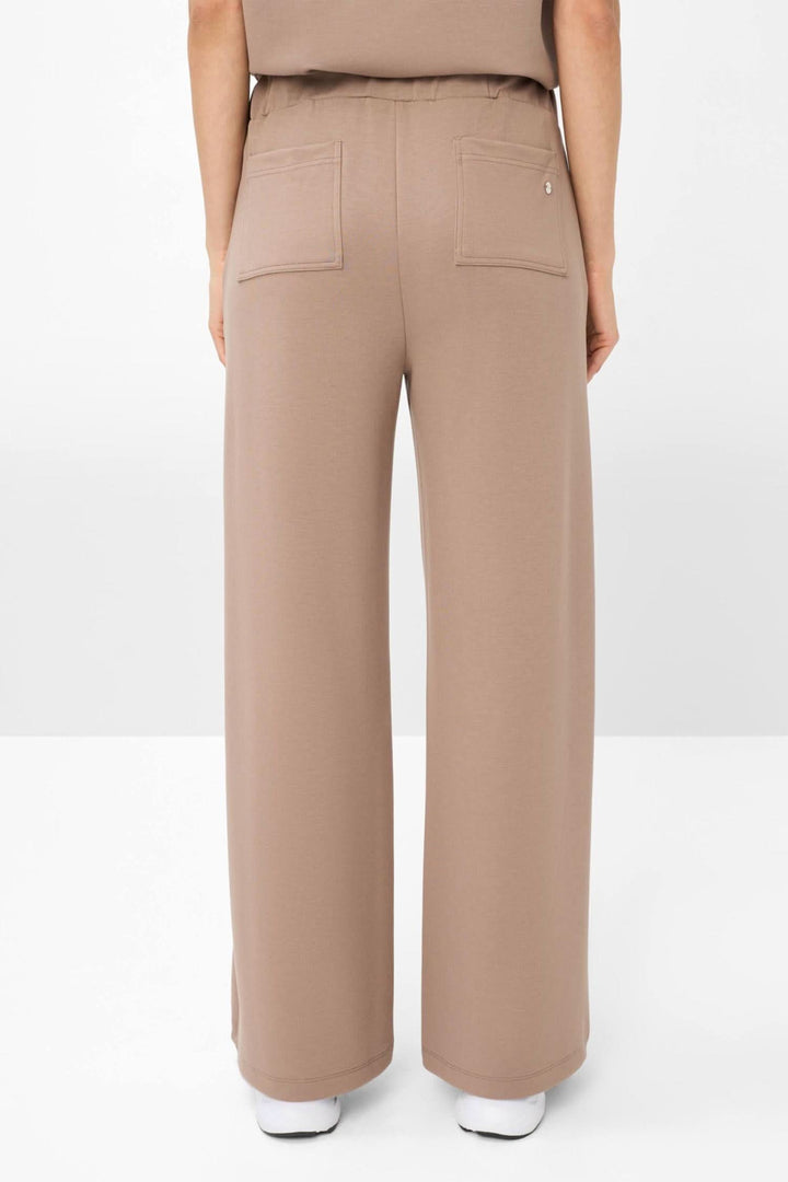 Pantalon palazzo Maine à jambe large, coupe ample, couleur beige, vue arrière avec poches, style moderne et décontracté.
