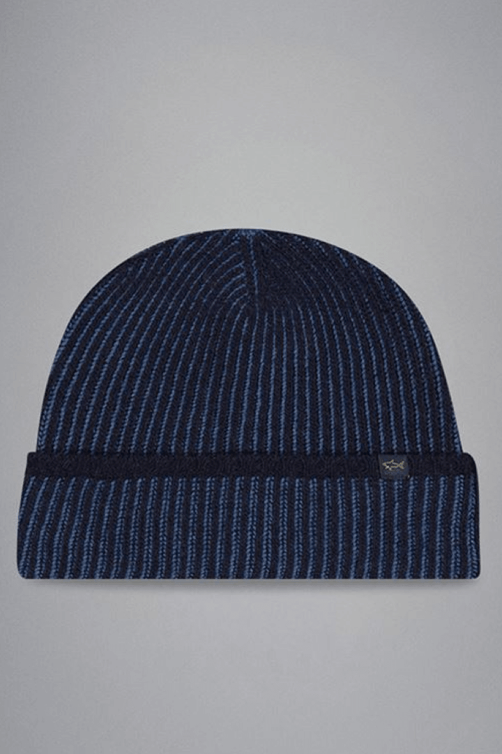 Tuque côtelée en laine vierge bicolore avec revers, idéale pour un look moderne et hivernal.
